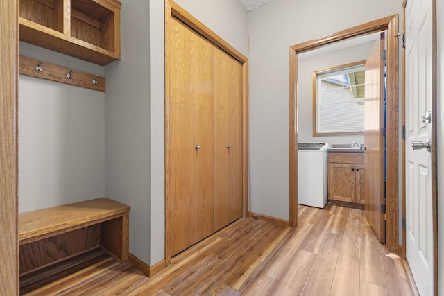 527 1st Ave NE, Lonsdale, MN 55046 - mudroom with washer / clothes dryer and light wood finished floors