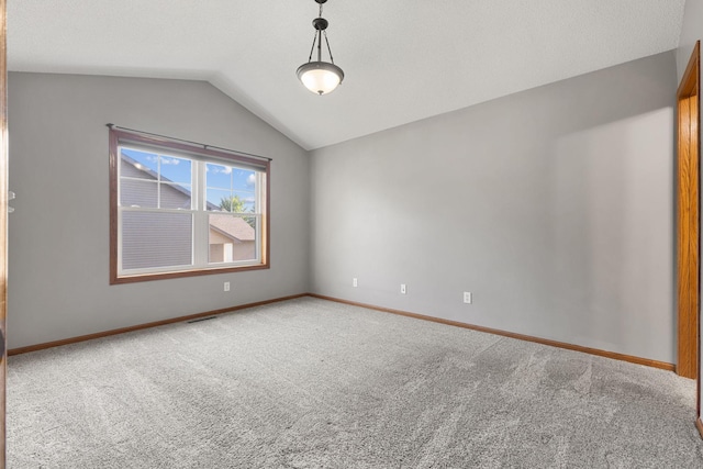 527 1st Ave NE, Lonsdale, MN 55046 - empty room with carpet flooring and vaulted ceiling
