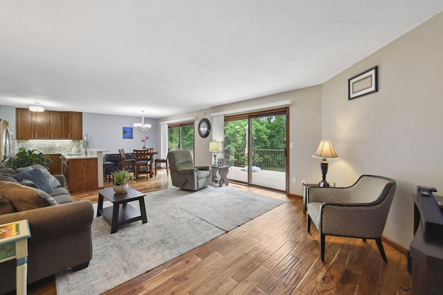 1398 Summit Cir W, Saint Paul, MN 55118 - living room featuring wood finished floors and a chandelier