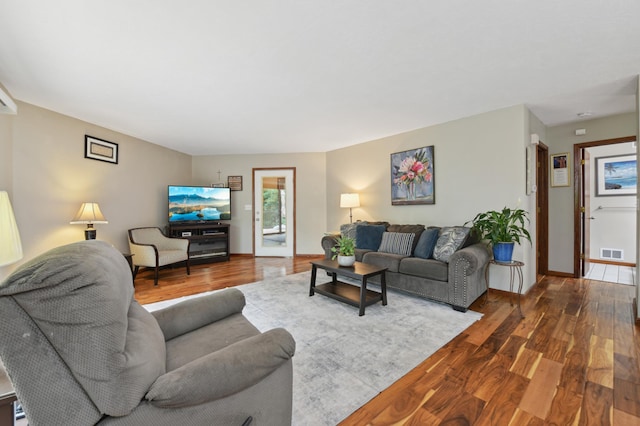 1398 Summit Cir W, Saint Paul, MN 55118 - living area with dark wood finished floors and baseboards