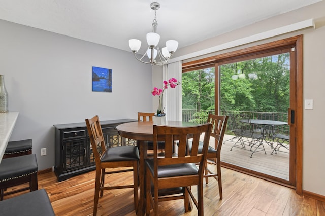 1398 Summit Cir W, Saint Paul, MN 55118 - dining space with a chandelier and light wood-type flooring