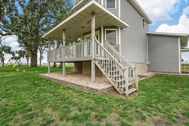 4193 Austin Rd, Owatonna, MN 55060 - back of property with a yard, a wooden deck, and stairway