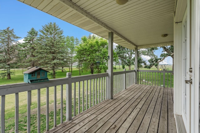 4193 Austin Rd, Owatonna, MN 55060 - wooden terrace featuring a yard and a shed