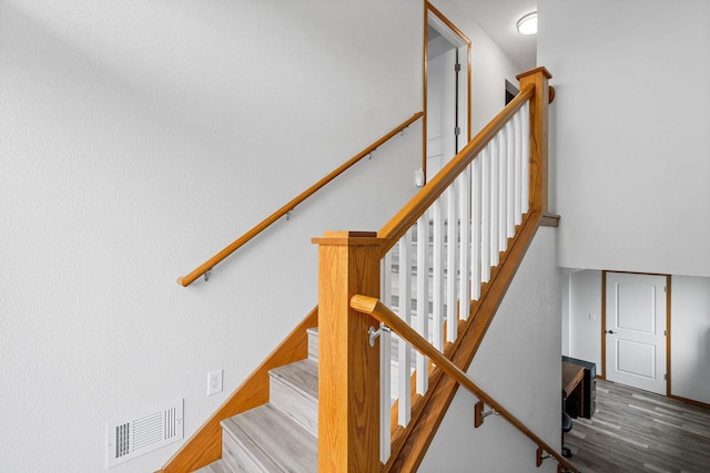 4193 Austin Rd, Owatonna, MN 55060 - stairs with wood finished floors and baseboards