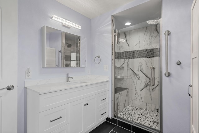 4193 Austin Rd, Owatonna, MN 55060 - full bath featuring a marble finish shower, vanity, and tile patterned floors