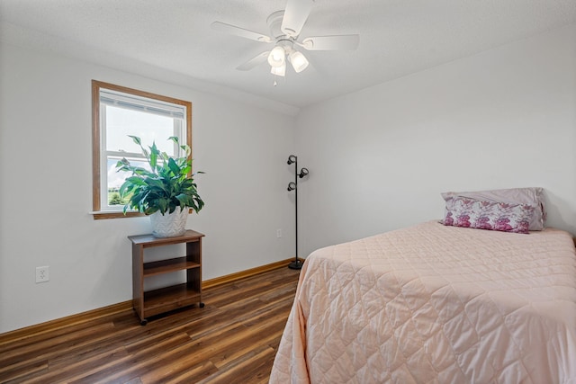 4193 Austin Rd, Owatonna, MN 55060 - bedroom featuring dark wood-style floors and a ceiling fan