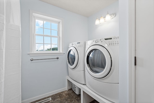 4193 Austin Rd, Owatonna, MN 55060 - laundry area with washing machine and dryer and baseboards