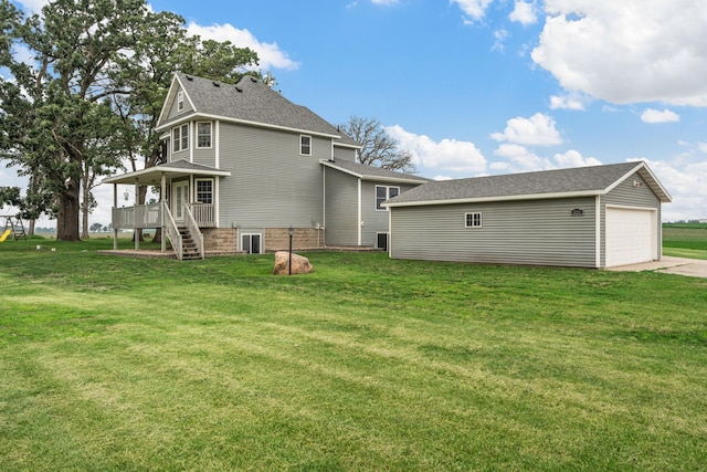 4193 Austin Rd, Owatonna, MN 55060 - rear view of house featuring a lawn, stairs, a garage, and a shingled roof