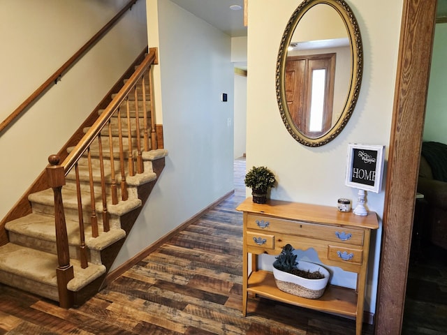 2607 4th Ave NW, Austin, MN 55912 - staircase with wood finished floors and baseboards