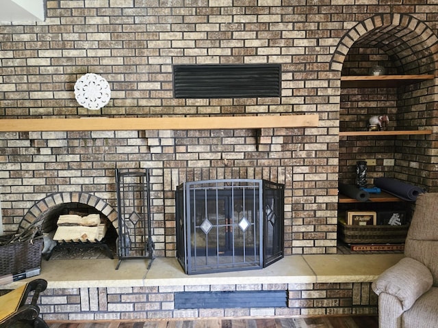 2607 4th Ave NW, Austin, MN 55912 - detailed view of a brick fireplace