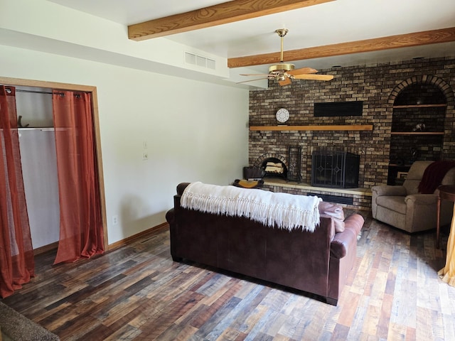 2607 4th Ave NW, Austin, MN 55912 - living area featuring a fireplace, wood finished floors, ceiling fan, and beamed ceiling
