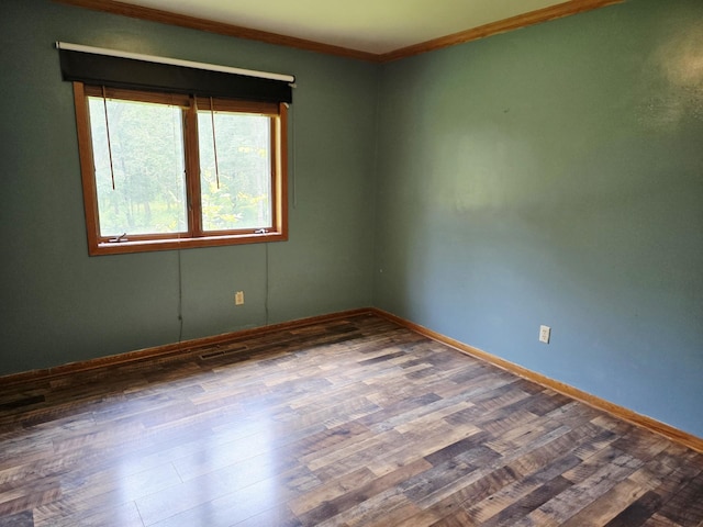 2607 4th Ave NW, Austin, MN 55912 - unfurnished room featuring crown molding and wood finished floors