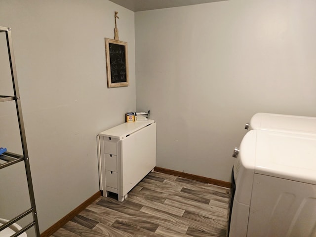 2607 4th Ave NW, Austin, MN 55912 - laundry room featuring separate washer and dryer and wood finished floors