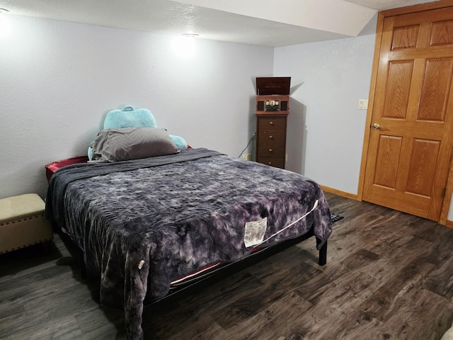 2607 4th Ave NW, Austin, MN 55912 - bedroom with wood finished floors and baseboards