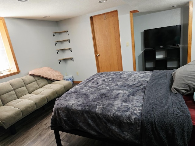 2607 4th Ave NW, Austin, MN 55912 - bedroom with wood finished floors