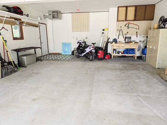 2607 4th Ave NW, Austin, MN 55912 - garage featuring a heating unit