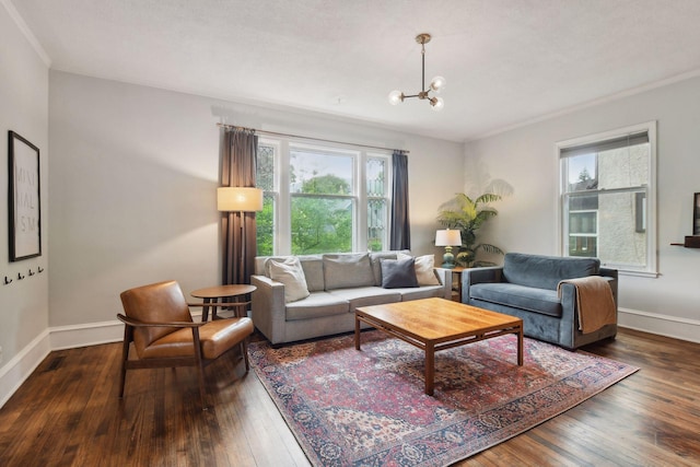 4210 Blaisdell Ave, Minneapolis, MN 55409 - living room with plenty of natural light, dark wood-type flooring, a chandelier, and ornamental molding