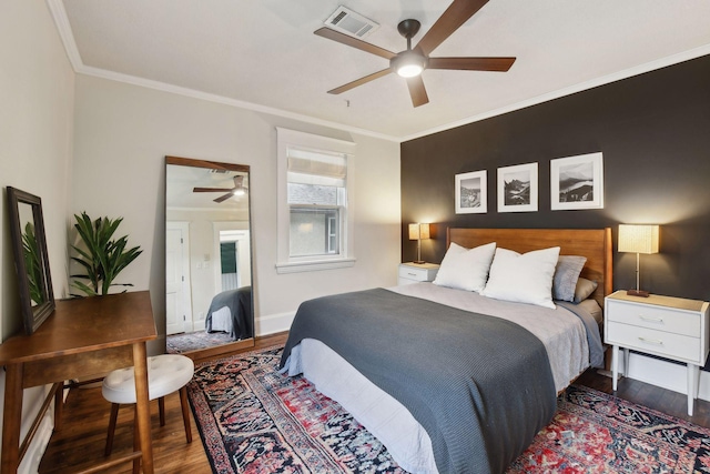 4210 Blaisdell Ave, Minneapolis, MN 55409 - bedroom featuring wood finished floors, crown molding, and ceiling fan
