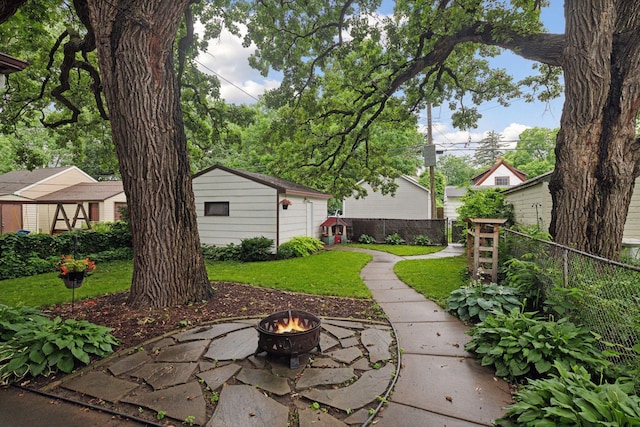 4210 Blaisdell Ave, Minneapolis, MN 55409 - view of yard featuring a fire pit and a patio area