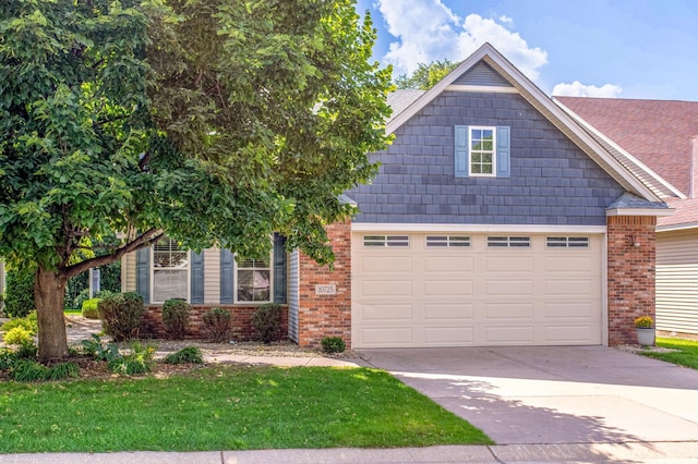 10725 Toledo Ln N, Brooklyn Park, MN 55443 - view of front of house with brick siding, driveway, and a front lawn