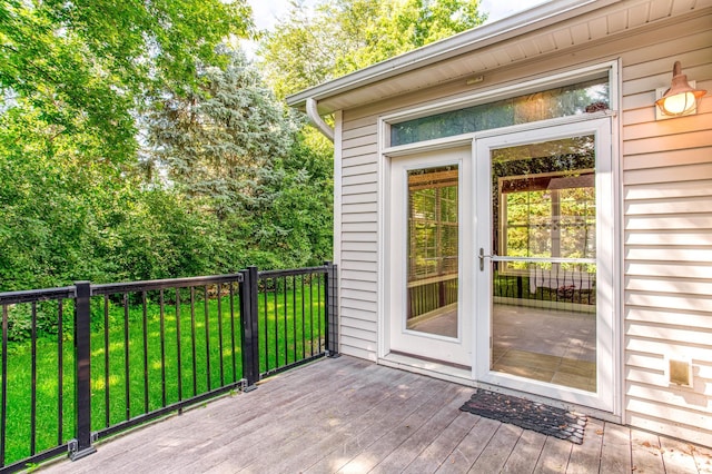 10725 Toledo Ln N, Brooklyn Park, MN 55443 - deck featuring a yard