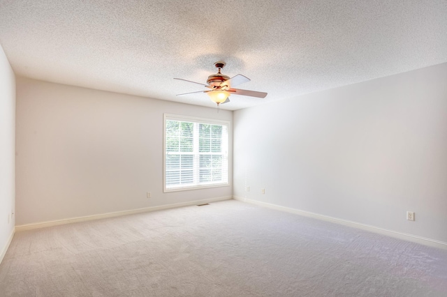 10725 Toledo Ln N, Brooklyn Park, MN 55443 - carpeted empty room featuring a ceiling fan and a textured ceiling