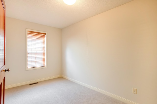 10725 Toledo Ln N, Brooklyn Park, MN 55443 - unfurnished room with light carpet and baseboards
