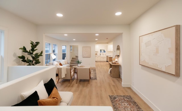 212 Diamond Lake Rd, Minneapolis, MN 55419 - living area featuring light wood-style floors, recessed lighting, and arched walkways
