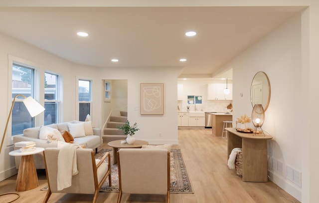212 Diamond Lake Rd, Minneapolis, MN 55419 - living area featuring light wood-type flooring, stairway, and recessed lighting
