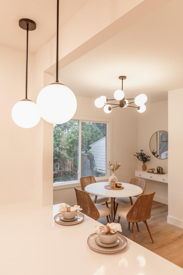 212 Diamond Lake Rd, Minneapolis, MN 55419 - dining space featuring a chandelier and wood finished floors