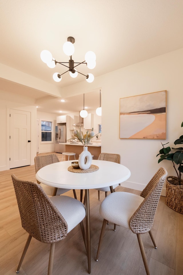 212 Diamond Lake Rd, Minneapolis, MN 55419 - dining room with a chandelier and light wood-style floors