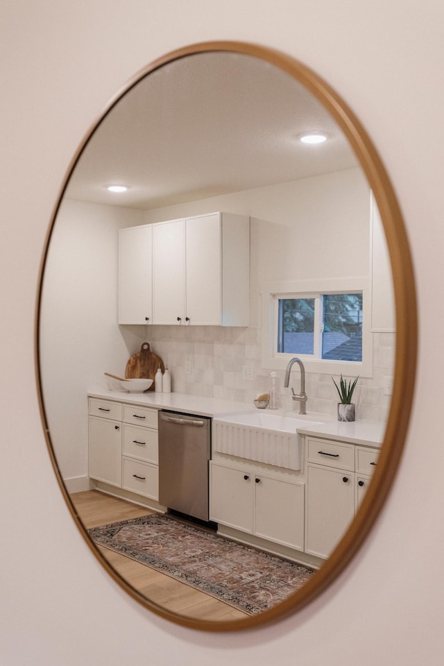 212 Diamond Lake Rd, Minneapolis, MN 55419 - kitchen with dishwasher, backsplash, white cabinetry, light countertops, and recessed lighting