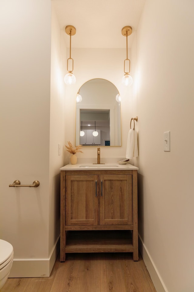 212 Diamond Lake Rd, Minneapolis, MN 55419 - half bath with wood finished floors and vanity