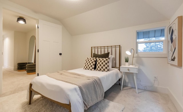 212 Diamond Lake Rd, Minneapolis, MN 55419 - bedroom featuring light colored carpet, lofted ceiling, and arched walkways
