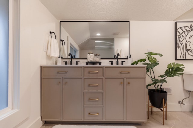 212 Diamond Lake Rd, Minneapolis, MN 55419 - full bathroom featuring double vanity and a textured ceiling