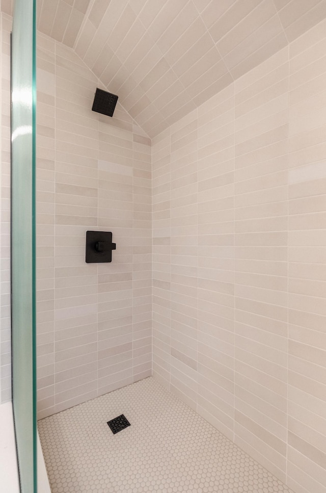212 Diamond Lake Rd, Minneapolis, MN 55419 - full bathroom with tiled shower, vaulted ceiling, and tile patterned floors