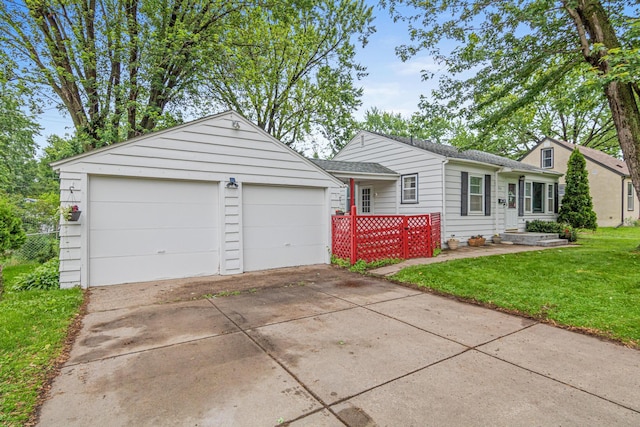 8313 Stevens Ave S, Bloomington, MN 55420 - view of front of property featuring roof with shingles and a detached garage