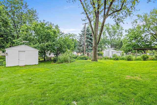 8313 Stevens Ave S, Bloomington, MN 55420 - view of yard featuring a storage unit and view of scattered trees