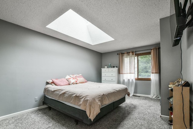 7097 Robinwood Bay, Woodbury, MN 55125 - carpeted bedroom with a skylight and a textured ceiling