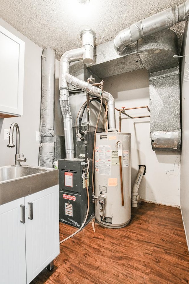 7097 Robinwood Bay, Woodbury, MN 55125 - utility room with water heater and a sink