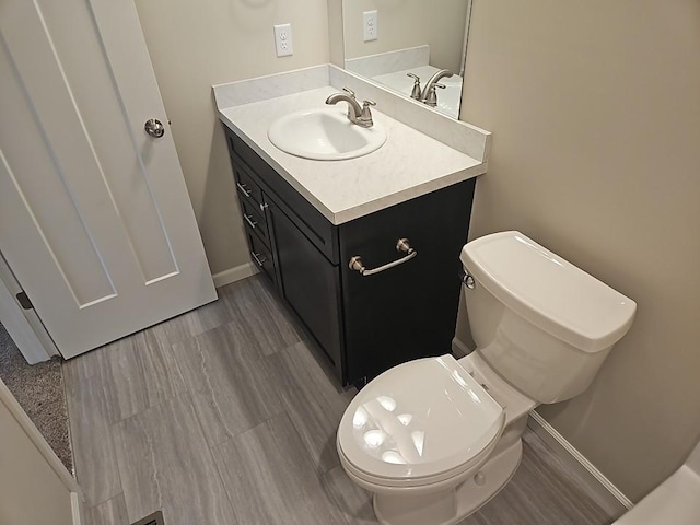 591 Alaska Loop, Cambridge, MN 55008 - half bathroom featuring vanity and baseboards