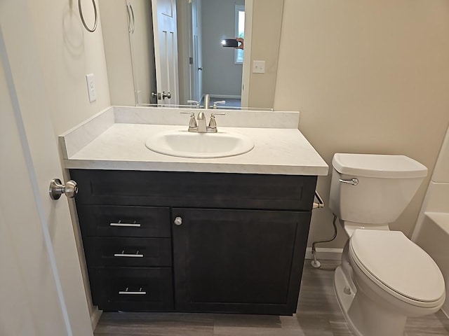 591 Alaska Loop, Cambridge, MN 55008 - bathroom with vanity and wood finished floors