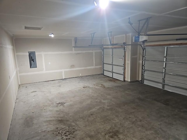 591 Alaska Loop, Cambridge, MN 55008 - garage with electric panel and a garage door opener