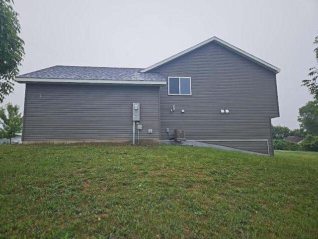 591 Alaska Loop, Cambridge, MN 55008 - rear view of house featuring a yard