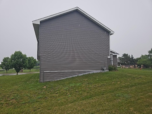 591 Alaska Loop, Cambridge, MN 55008 - view of property exterior with a lawn