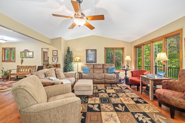 23148 Glenhaven Dr, Nevis, MN 56467 - living room with lofted ceiling, wood finished floors, and ceiling fan