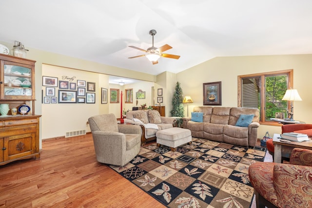 23148 Glenhaven Dr, Nevis, MN 56467 - living room featuring light wood finished floors, ceiling fan, and lofted ceiling