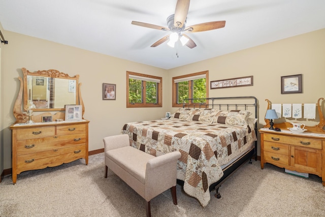 23148 Glenhaven Dr, Nevis, MN 56467 - bedroom with light carpet and a ceiling fan