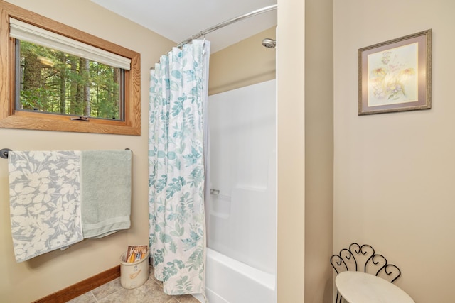 23148 Glenhaven Dr, Nevis, MN 56467 - bathroom with shower / tub combo and tile patterned floors
