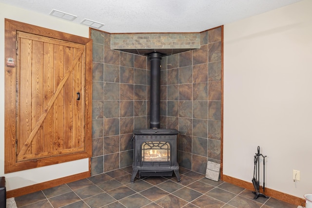 23148 Glenhaven Dr, Nevis, MN 56467 - detailed view of a textured ceiling and a wood stove